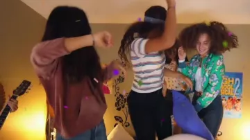 The bomber jacket is green and the flowers in the clip, The best of 2 Carla