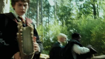 El libro de los monstruos que asalta a Neville Londubat (Matthew Lewis) en Harry Potter y el prisionero de Azkaban