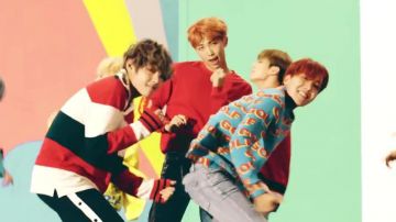 Le sweat tricolore Gucci dans le clip DNA de BTS