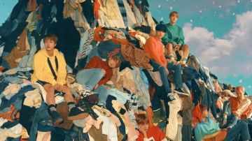 The sweat yellow Marques'almeida in the clip Spring Day BTS