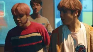 The sweater striped Cardigan in the clip Spring Day BTS