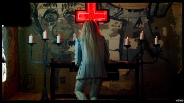 The jean jacket faded Gucci in the clip Praying for Kesha