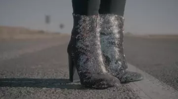 Boots sequined Bebe Rexha in her video clip Meant to Be