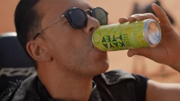 Sunglasses Ray-Ban RedOne in her video clip Boom Boom