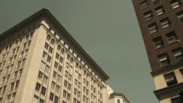 The intersection of S Spring St and 7th St in the heart of the Fashion District of Los Angeles in the clip Wake Me Up of Avicii