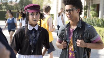 The crop top with fishnets to Nico Minoru (Lyrica Okano) in Marvel's Runaways S01E07