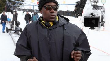 The waterproof poncho Quechua Jean-Gabriel (Lucien Jean-Baptiste) in The second star