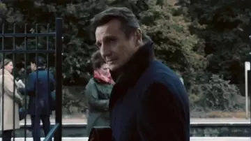 The black mantle of Michael Woolrich (Liam Neeson) in The Passenger