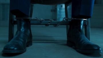 Les boots noires de Ulysses Klaue (Andy Serkis) dans Black Panther