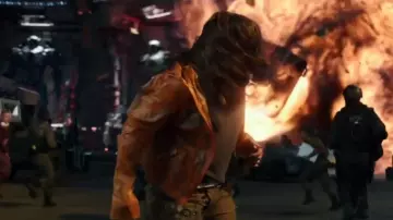 The windproof hooded orange Amara Namani (Cailee Spaeny) in Pacific Rim: Uprising