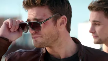 Overdrive looks: Scott Eastwood wears Lacoste sunglasses to portray Andrew Foster
