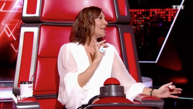 The blouse was white Oud Paris worn by Zazie in The Voice : The most beautiful voice in broadcast on the 27th of January 2018