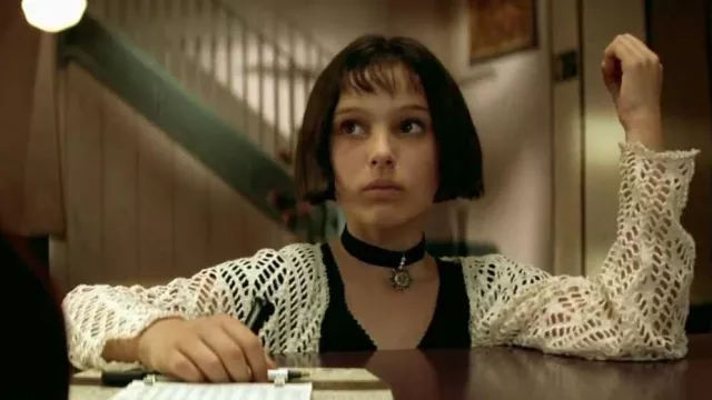 The sun pendant choker necklace worn by Mathilda Lando (Natalie Portman) in the movie Leon