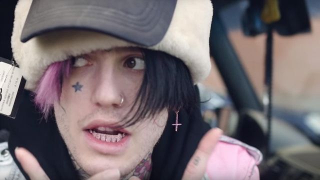The inverted cross rhinestone pink Lil Peep in the clip Benz Truck