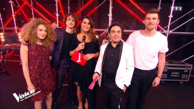 The black dress asymmetrical Karine Ferri in #TheVoice of the 05/05/2018