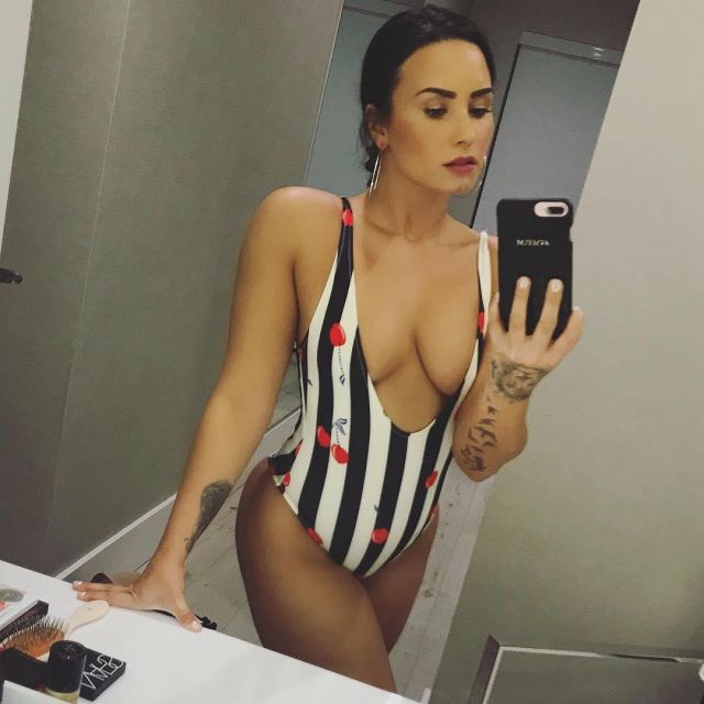 The swimsuit One-Piece pattern-cherries Demi Lovato on his account Instagram