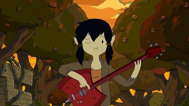 A functional replica of the bass guitar, red in the shape of a axe of Marceline in Adventure Time