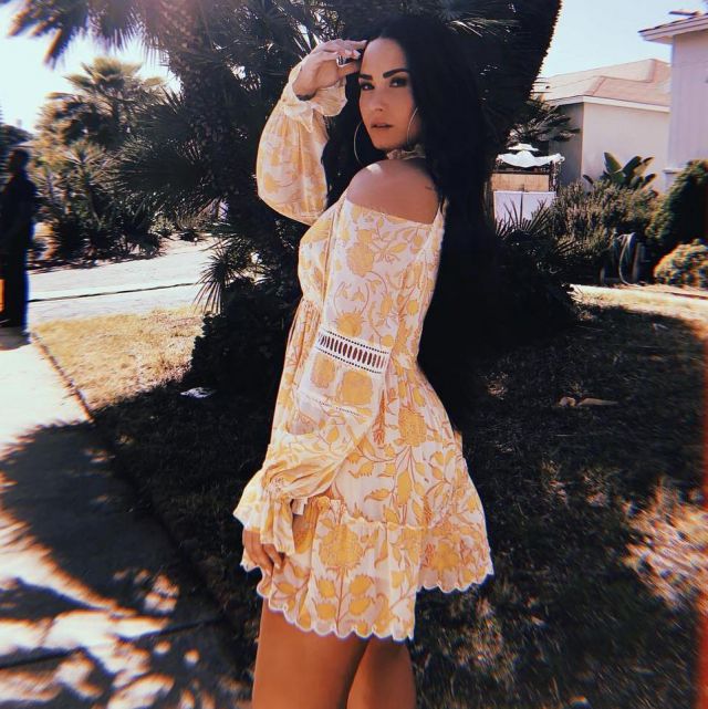 The yellow flower dress Hemant & Nandita worn by Demi Lovato on Instagram