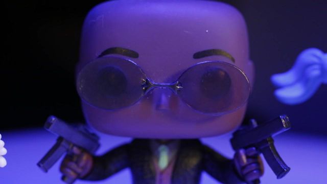 The figurine FunKo Pop Movies The Matrix Morpheus in the YouTube video The Avengers in the Living room ! of LinksTheSun