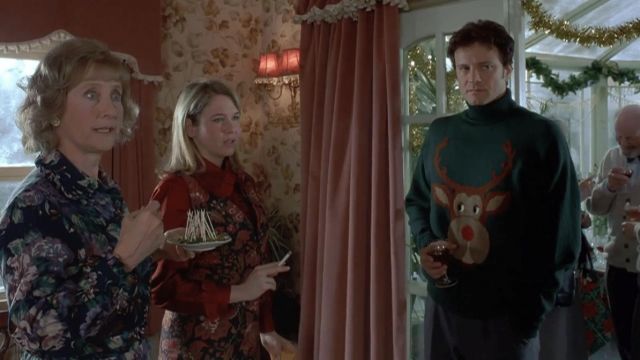 Le pull vert avec le renne de Noël porté par Mark Darcy (Colin Firth) dans Le Journal de Bridget Jones