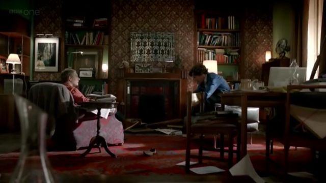 The mirror is vintage, in the apartment of Sherlock Holmes (Benedict Cumberbatch) in Sherlock