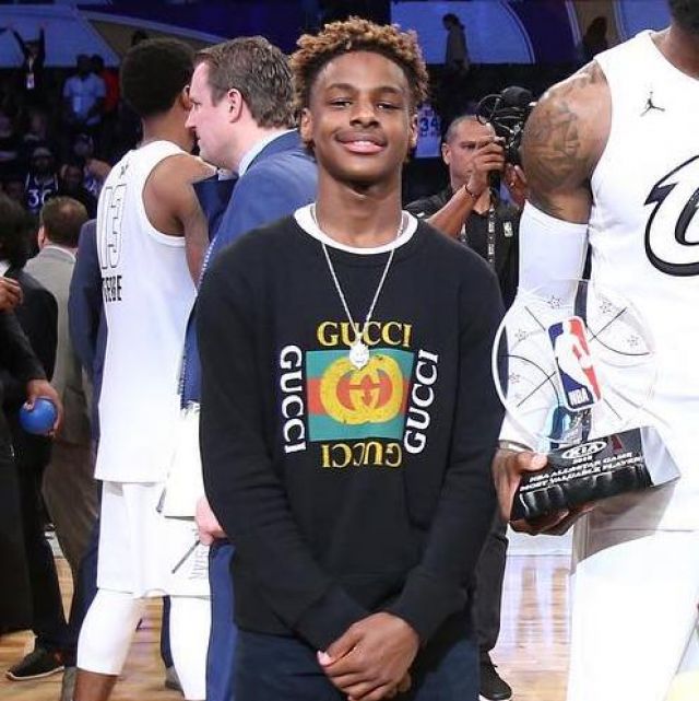 The black sweater with Gucci logo seen on the instagram from Complex
