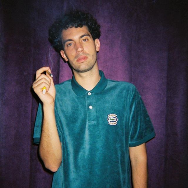 The polo velvet SUPREME x Lacoste worn by Jean Jass on his account Instagram