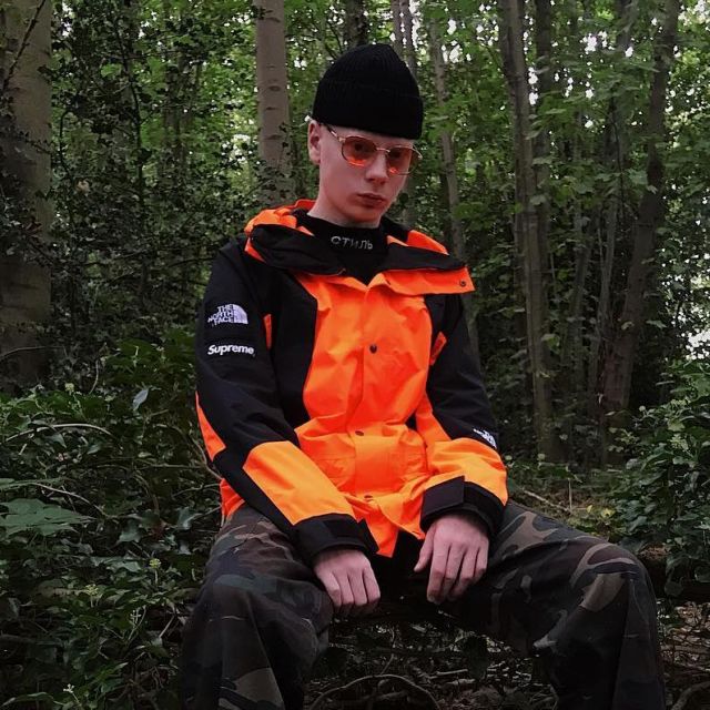 north face supreme orange jacket