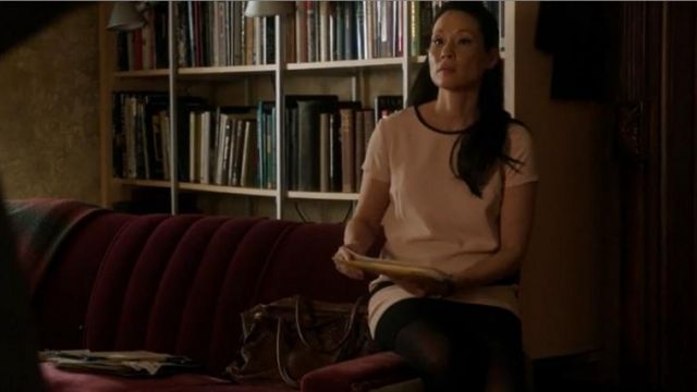 The pink dress and Dr. Joan Watson (Lucy Lui) in Elementary