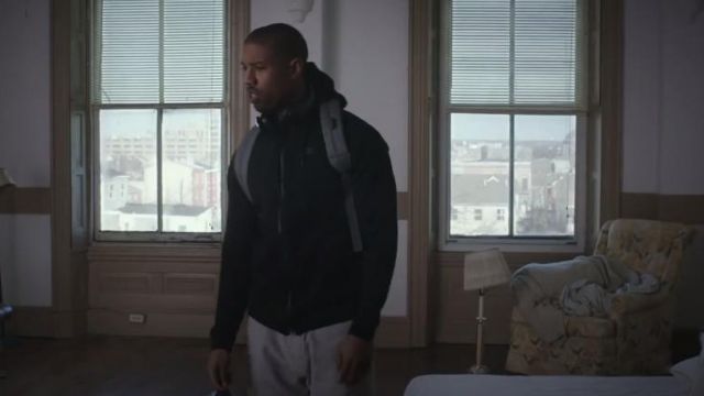 The gray Herschel Supply Co. backpack worn by Adonis Creed (Michael B. Jordan) in the movie Creed