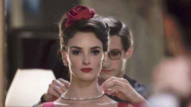 The pink satin in the hair of Victoire Doutreleau (Charlotte Le Bon) in Yves Saint Laurent