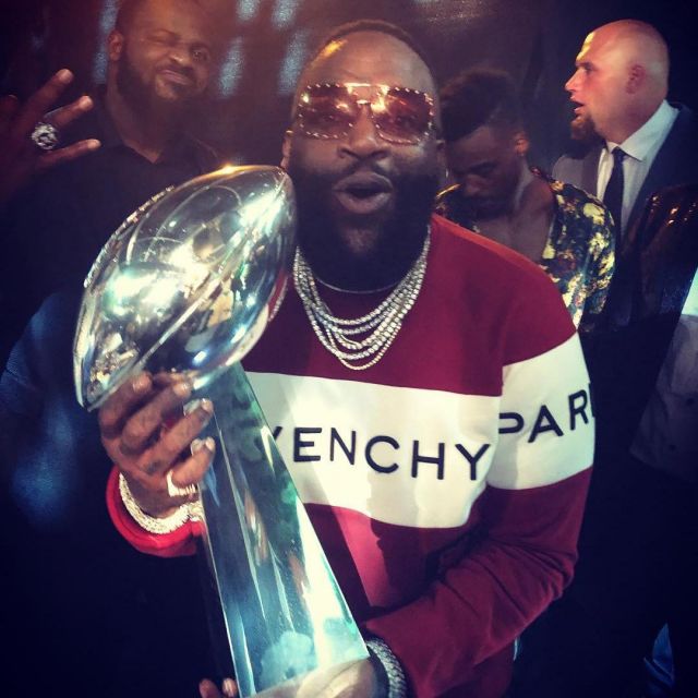 The Sweat Red Givenchy With A White Strip Of Rick Ross On His