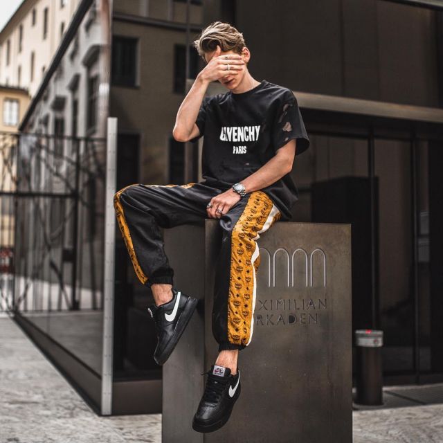 The AF1 Swoosh Pack black that is on the influencer Max "munich_style" on his Instagram