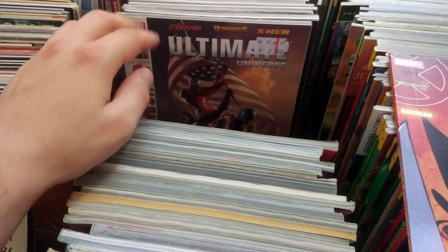 The album Ultimate Universe 9 Paperback in the YouTube video I'VE FINALLY FOUND THE COMICS (RARE ?) #VLOG (2017)