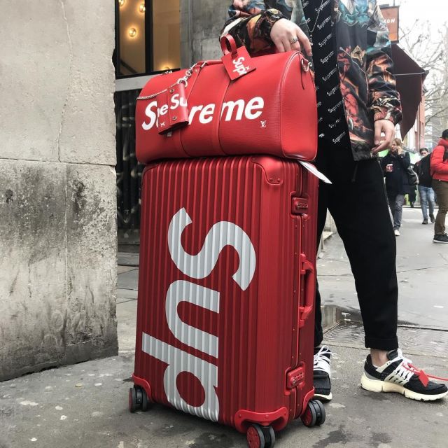 supreme red suitcase
