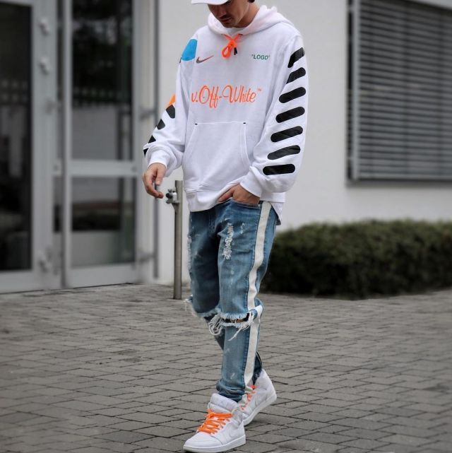 The Jordan 1 Retro Mid white that is on the influencer Tommeeblack on his Instagram