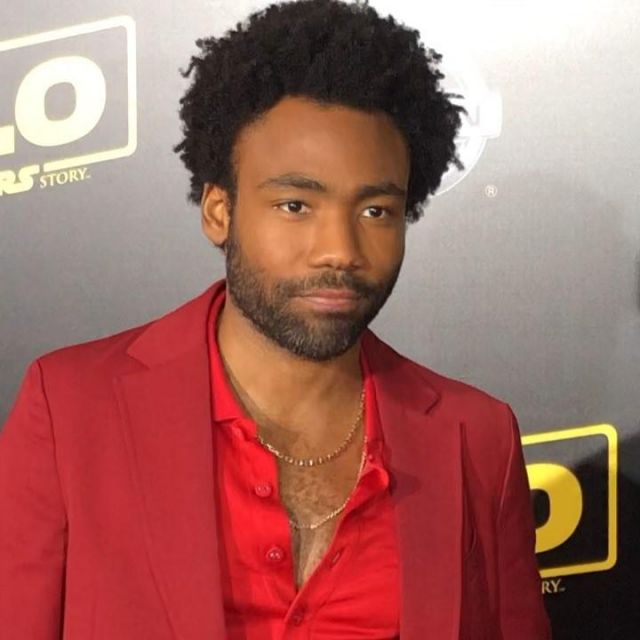 Red shirt worn by Donal Glover as seen in the red carpet for Solo: A Star Wars Story premiere