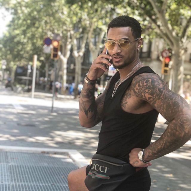 Sac Banane Gucci noir porté par Edwin Jackson sur son compte instagram