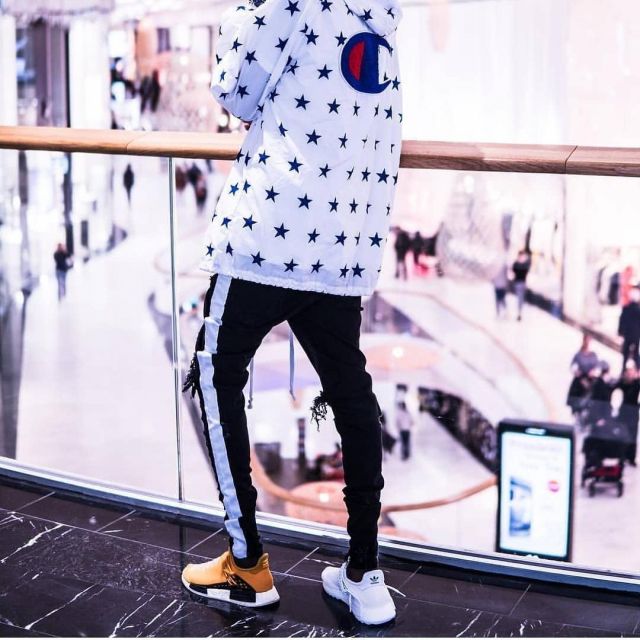 the pair of addidas NMD yellow on the post instagram of outfitsociety