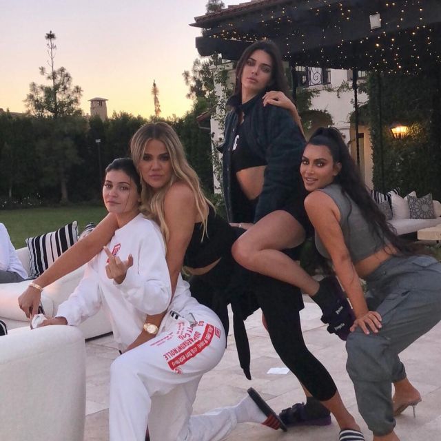 Adidas x Alexander Wang white and red pants worn by Kylie Jenner on her sister Khloé Kardashian's Instagram