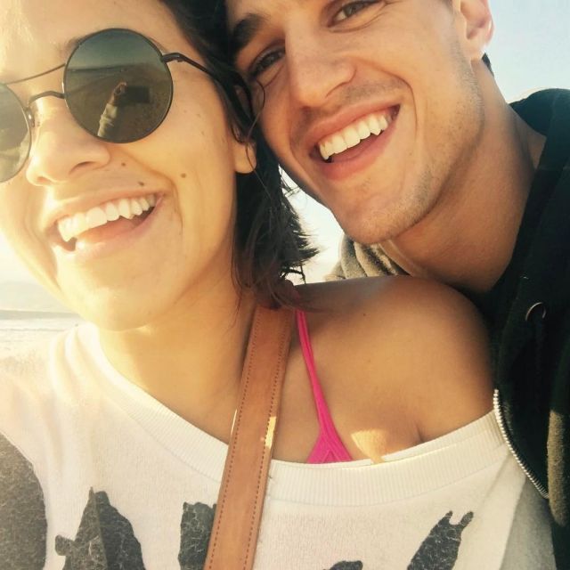 The round sunglasses black Giorgio Armani worn by Gina Rodriguez with her boyfriend on instagram