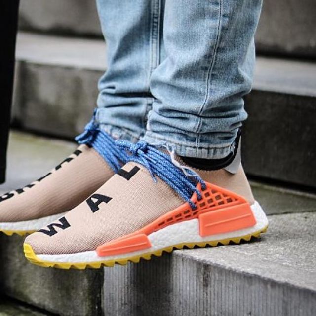 The sneaker adidas Human Race NMD orange and beige of the young ...