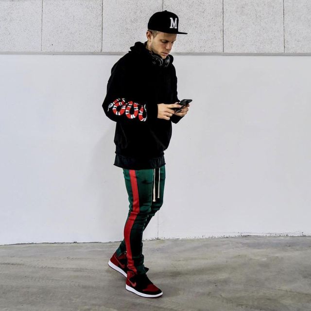 Sneakers red Jordan 1 Retro High Flyknit Bred the footballer Marco Meilinger on his instagram | Spotern