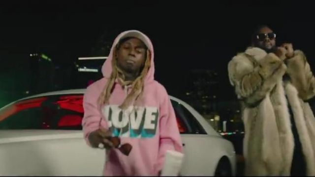 The white cap "Opening Ceremony" of Lil Wayne in the video clip Corazon (feat. Maitre Gims & French Montana)