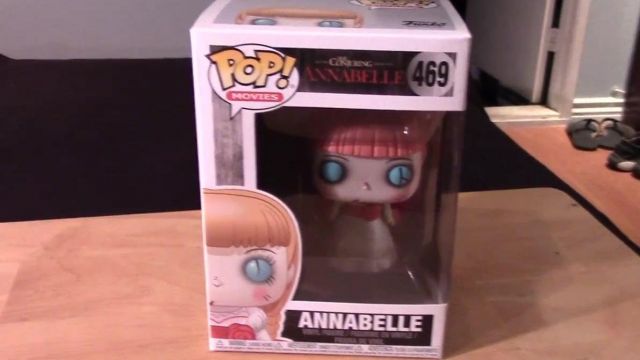 The figurine funko pop doll Annabelle in the youtube video Funko Pop Annabelle Figure the conjuring