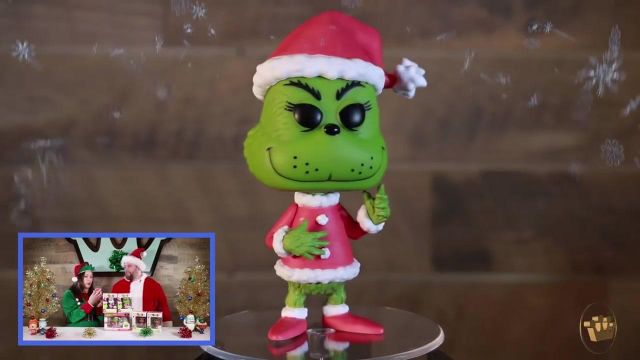 The figurine funko pop the grinch in the youtube video Dr. Seuss The Grinch Unboxing