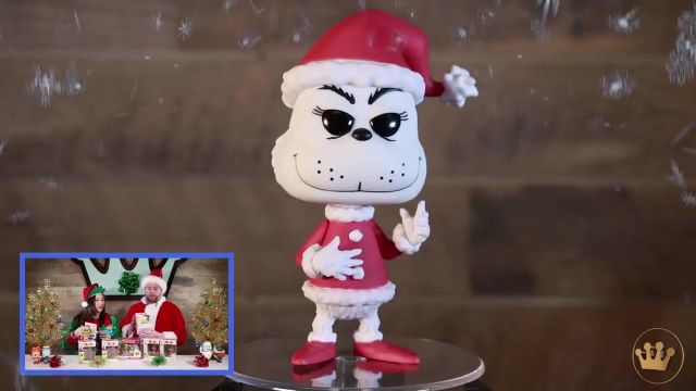 The figurine funko pop the grinch black and white in the youtube video Dr. Seuss The Grinch Unboxing