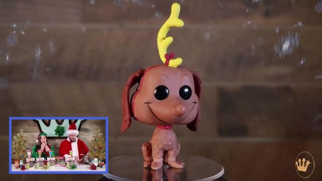 The figurine funko pop Max from the movie The grinch in the youtube video Dr. Seuss The Grinch Unboxing