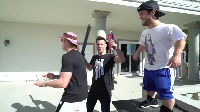 The black t-shirt USA Maverick the buddy Logan Paul in the video youtube "Pretending to be Jake Paul for a day !"