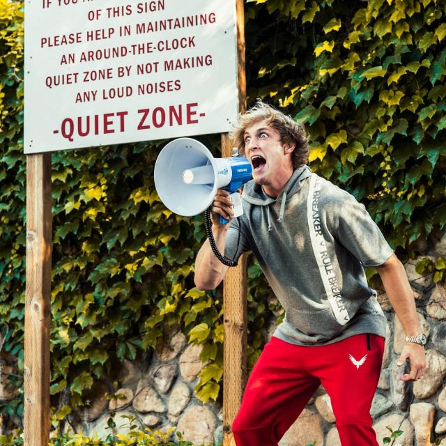 The pants sport red Maverick Logan Paul with a megaphone on Instagram